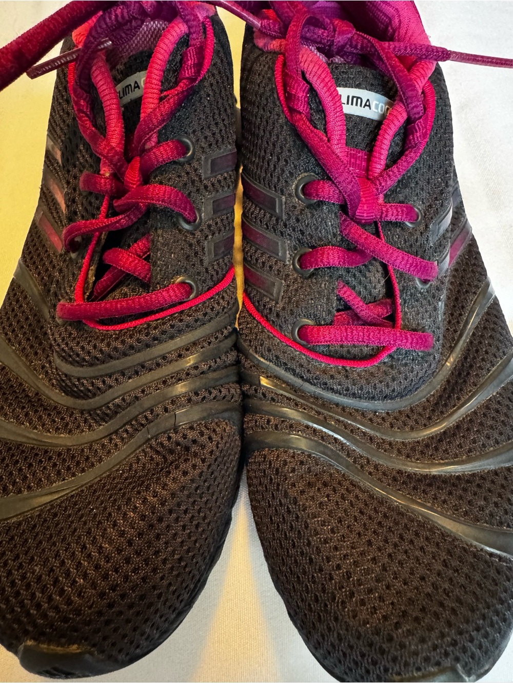 Nike Women's Black Mesh Running Shoes with Magenta Accents